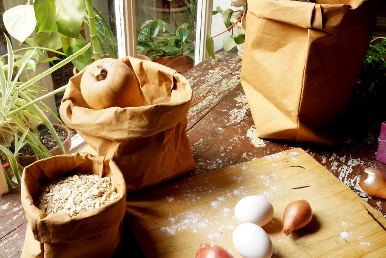 Brown Paper bag storage made from washable, reusable and recycled paper. Vegan Leather brown bag for your home image 4