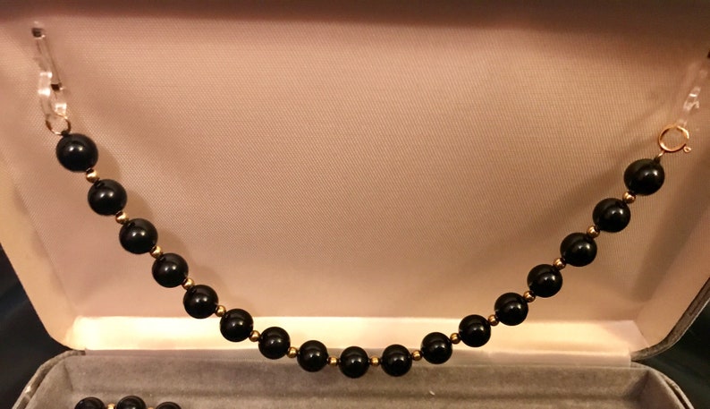 Vintage black and gold necklace and bracelet set