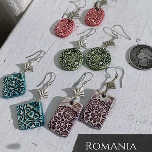 Romanian Patterned stamped clay & Fleur-de-lis geometric charm earrings