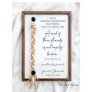 A Cord of Three Strands unity ceremony braided cord cross sign with natural white cotton and Jute cords, non traditional unity ceremony idea