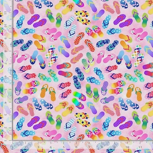May include: A pink fabric featuring a repeating pattern of colorful flip-flops in various designs, including stripes, polka dots, and floral accents. A ruler along the left and bottom edges shows measurements in inches up to 11 inches.