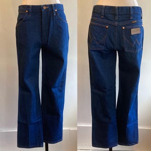 Vintage WRANGLERS in Dark 100% Cotton Denim Jeans. Made in USA. BLACK Label. Original size is 31 x 30