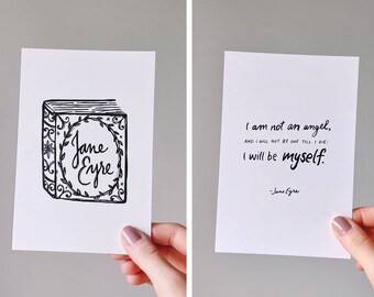 May include: Two printable cards featuring a black and white illustration of a book with the text "Jane Eyre" and a quote from the book: "I am not an angel, and I will not be one till I die: I will be myself." - Jane Eyre