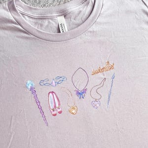 Magical Icons Tee / 2000s Nostalgia / Princess and the Pauper, Diamond Castle, Magic of Pegasus, 12 Dancing Princesses, Fairytopia