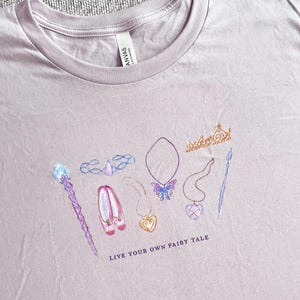 Magical Icons Tee: "Live Your Own Fairy Tale" / 2000s Nostalgia / Princess and the Pauper, Diamond Castle, 12 Dancing Princesses, Fairytopia