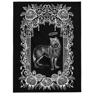 May include: Black blanket featuring a detailed white illustration of a wolf within a decorative floral and archway design. The wolf is standing, and a crown of thorns hovers above its head. The design includes the Virgo zodiac symbol.