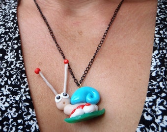 Collar and her snail pendant