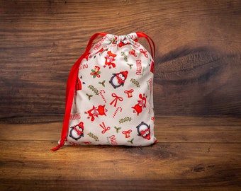 Sac cadeau de Noël en tissu écologique réutilisable. Sac cadeau de Noël Santa & Penguins-Taille 24x18.5cm-FGB71