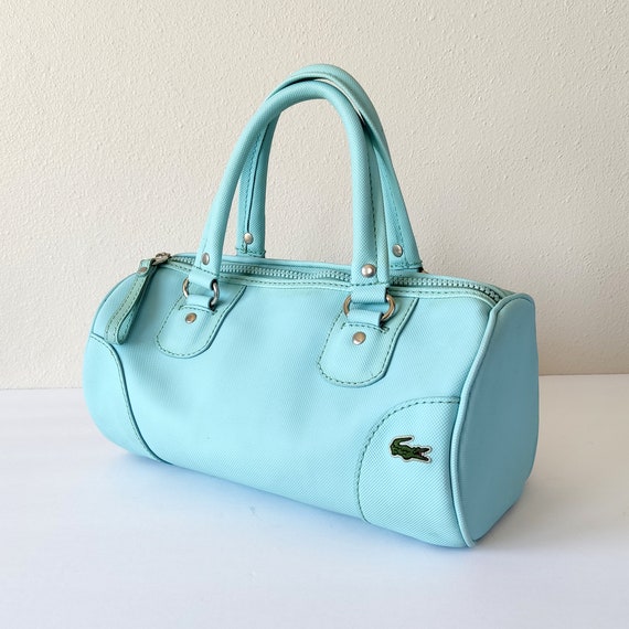 Chic Lacoste Light Blue Cylinder Handbag - Trendy 