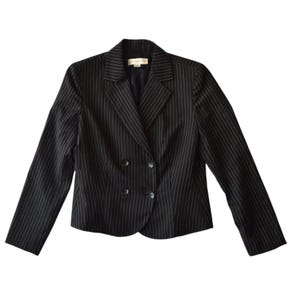 May include: A black blazer featuring thin white pinstripes, a notched lapel, and a double-breasted front closure with four buttons. The garment has long sleeves, structured shoulders, and a tailored fit with a visible interior brand label.
