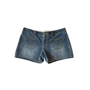 May include: A pair of blue denim shorts featuring a medium wash, a button and zipper fly closure, belt loops, and two prominent patch pockets on the front. The garment has visible yellow stitching along the seams and a classic hemline.