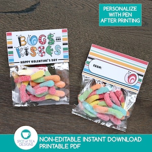 May include: Printable Valentine's Day treat bag with a colorful striped design. The bag has a label that says "Bugs and Kisses" with a cartoon bug and a snail. The text "Happy Valentine's Day" is printed below the label. The bag is filled with gummy worms.