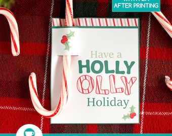 May include: Printable Christmas gift tag with a red and white candy cane and the text "Have a HOLLY OLLY Holiday".
