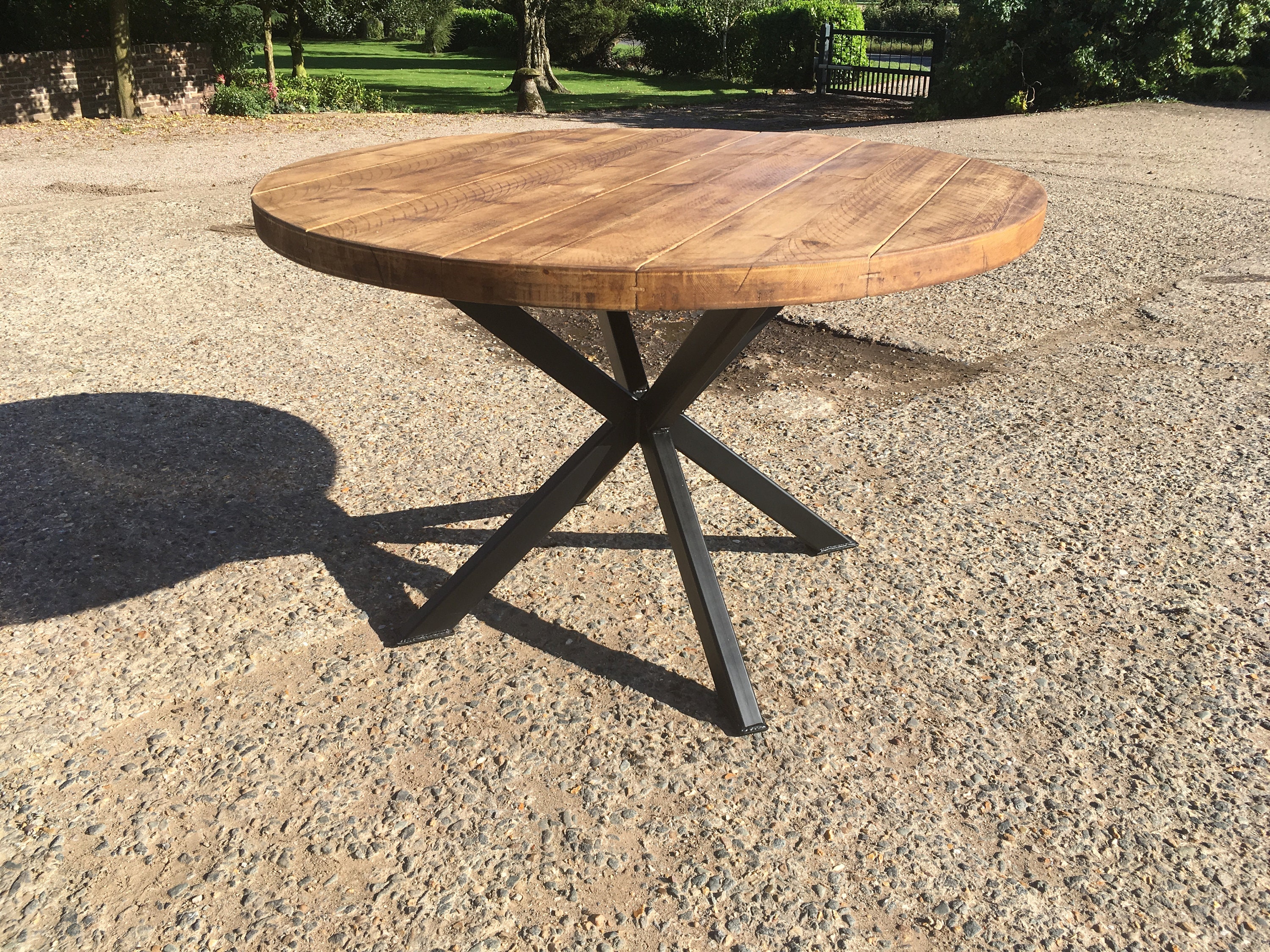 Industrial Style Round Table With Starburst Legs