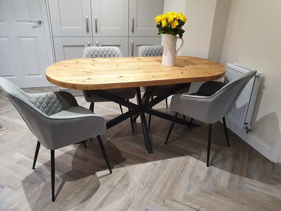 Starburst oval dining table best sale