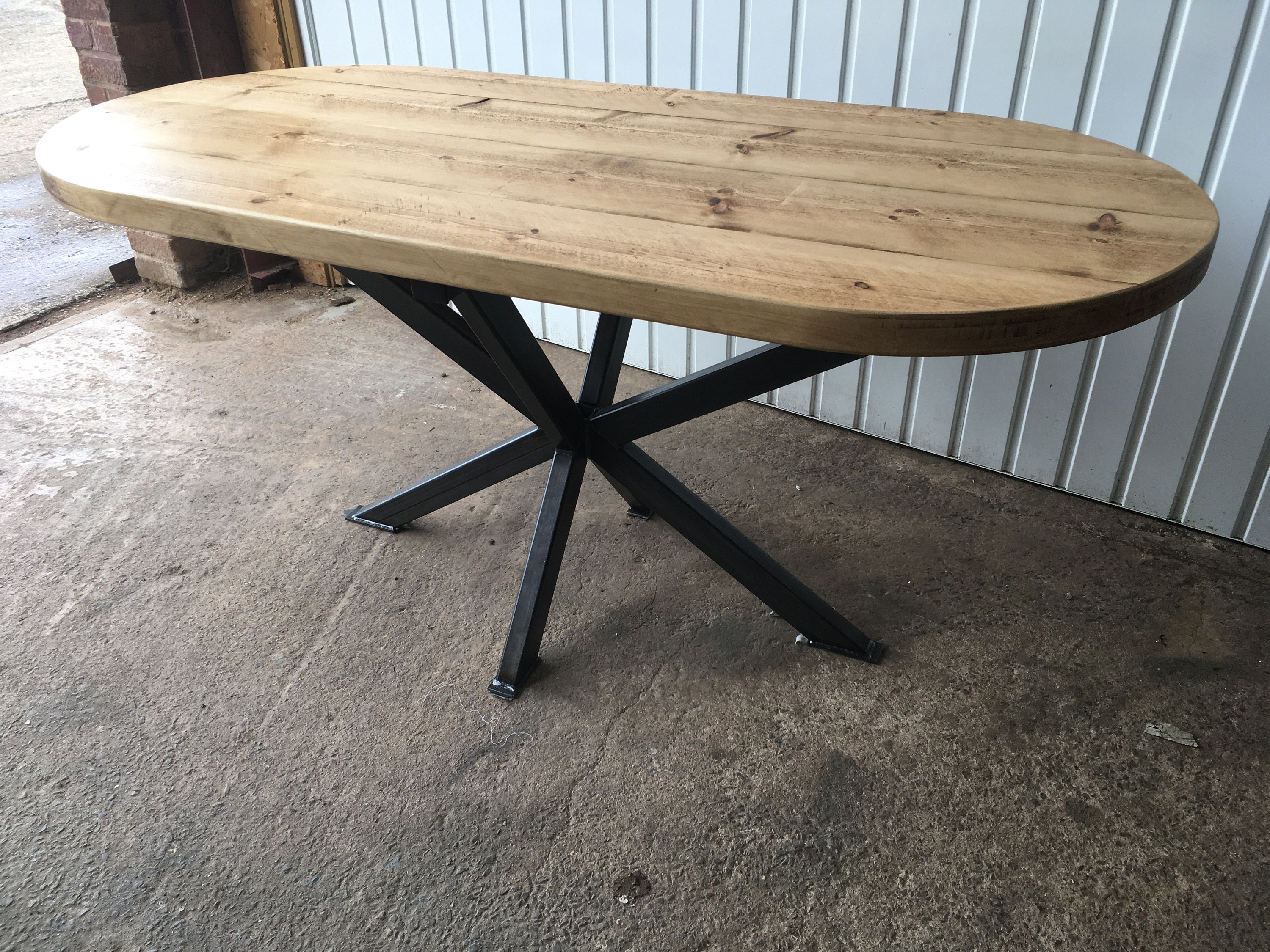 Oval Table With Starburst Legs