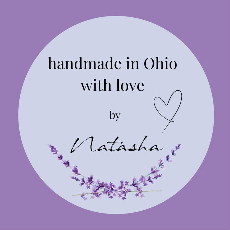 May include: A round, light purple sticker with the text "handmade in Ohio with love by Natasha." A black heart and a lavender sprig design are also included. The background is a darker shade of purple.