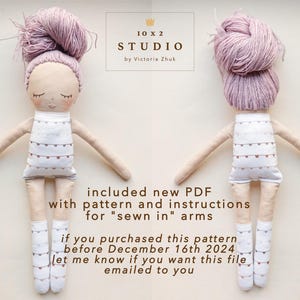 May include: Two handmade dolls with pink yarn hair and white dresses with brown accents. The dolls are facing opposite directions. The text "included new PDF with pattern and instructions for "sewn in" arms" is below the dolls. The text "if you purchased this pattern before December 16th 2024 let me know if you want this file emailed to you" is below the first line of text.