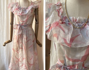 vintage 1950’s pink sheer cocktail dress with ruffle details size S