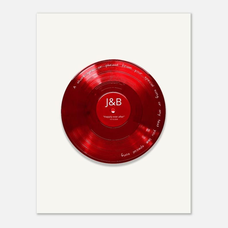 May include: A circular red vinyl record featuring white text printed on the surface. The center label displays the letters J&B, the phrase "Happily ever after", and a date. The outer edge includes the text "A short lyric or phrase from your special song or any text you like special song".