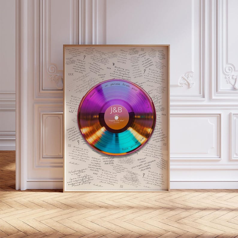 May include: A framed print featuring a central iridescent vinyl record with a purple and gold center label displaying the text J&B. The background is filled with repeated handwritten messages wishing a lifetime of love, laughter, and memories.
