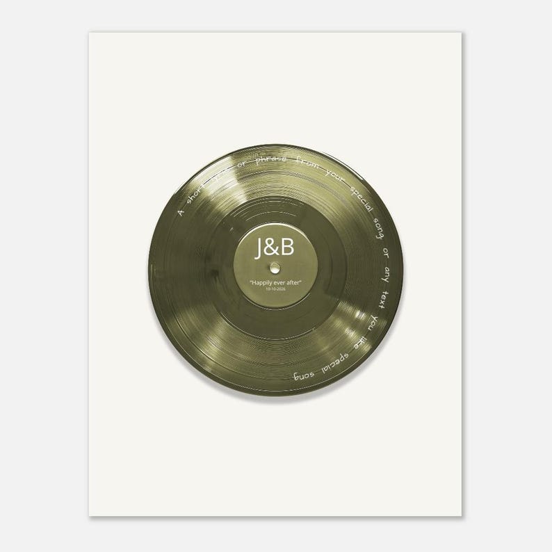 May include: A circular, translucent olive-green vinyl record featuring a central label with the white text J&B and Happily ever after 10.10.2024. The record surface includes the white text A short line or phrase from your special song or any text you like special song.
