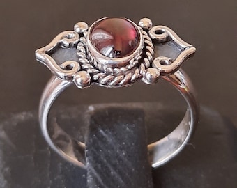 Garnet and sterling silver ring