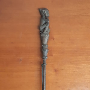 Wooden sculpture from Borneo carved stick figured Tun Tun