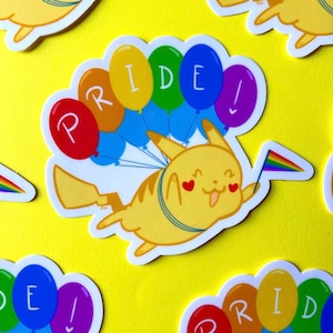 May include: A yellow cartoon Pikachu holding a rainbow flag and flying with a bunch of rainbow balloons that spell out "PRIDE!"