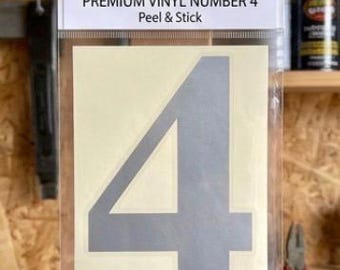 4" vinylstickers hoog, één nummer