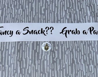 10”—15” - Fancy a Snack.  Grab a Pack! - Vinyl Decal Wording.