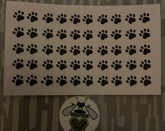 Mini 1/4” Paw Print Vinyl Decals. (50)