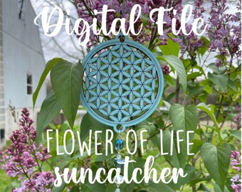 May include: Digital file for a flower of life suncatcher. The suncatcher is made of wood and has a blue and black geometric design. It is hanging from a branch with crystal beads.