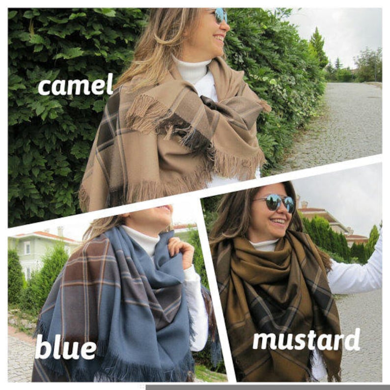 May include: Three women wearing different plaid scarves in camel, blue, and mustard colors. The scarves are made of soft, warm fabric and have a fringed edge.