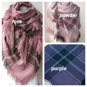 May include: Three plaid scarves with fringe edges in different colors: rose, powder, and purple.