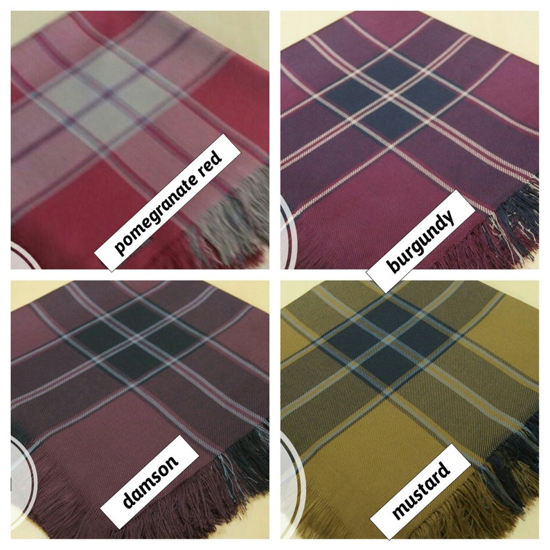 May include: Four different plaid fabric swatches with fringed edges. The swatches are in the colors pomegranate red, burgundy, damson, and mustard.