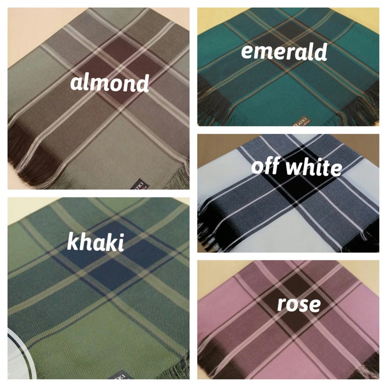 May include: Five different plaid scarves in various colors, including almond, emerald, off white, khaki, and rose.