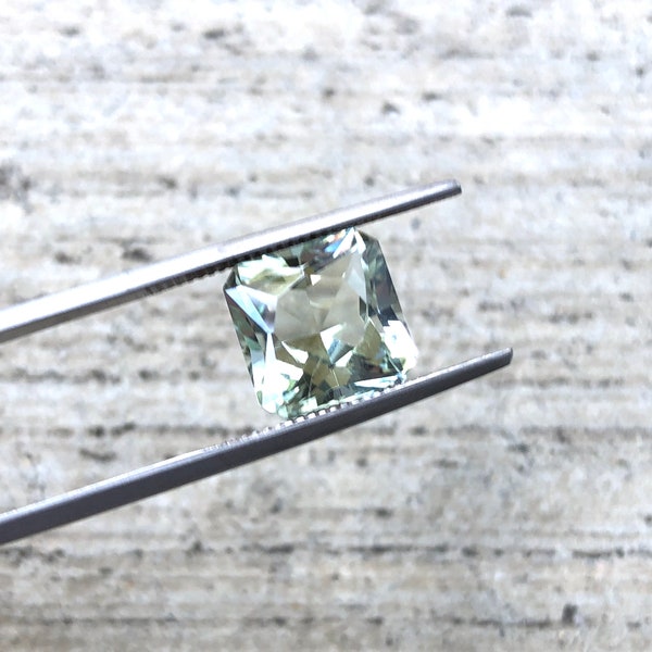 Green Amethyst Prasiolite. 9mm Square Octogan Fancy Cut. Approximately 3.1 Total Carat Weight.