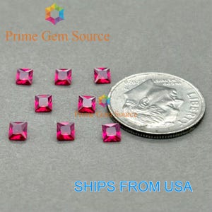 May include: Nine square-cut, vibrant red gemstones are arranged on a gray surface, next to a US quarter coin. The gemstones are a deep, rich red color. The text "Prime Gem Source" and "SHIPS FROM USA" are also visible.