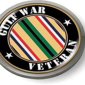 May include: A black and gold round pin with a white star on each side. The center of the pin features a yellow, green, red, white, and blue striped ribbon with the text "GULF WAR VETERAN" in white letters around the ribbon.