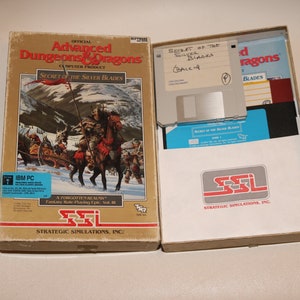 Advanced Dungeons and Dragons Secret of the Silver Blades SSI Tsr Shadow Sorcerer IBM/PC 5.25" disquete D&D