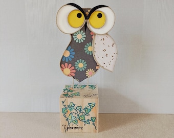 Modern sculpture in animated string and paper, Feathered Owl, paper sculpture and poetry