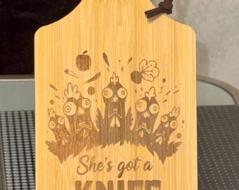 She’s got a knife cutting board digital download