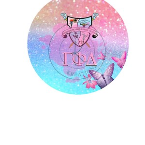 May include: A round design with a glittery background in shades of pink, blue, and white. The design features a crest with text, crossed swords, and the Greek letters ΓΦΔ. Pink butterflies and flowers are also included.