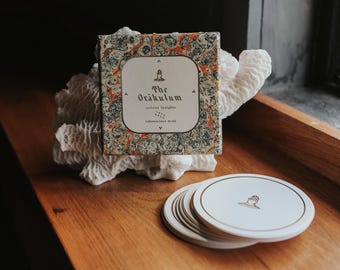 The Orákulum Oracle Deck - a 44 card collage style Victorian fever dream orakulum