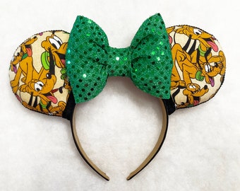 Pluto-muisoren met groene strik met lovertjes, handgemaakte hoofdband