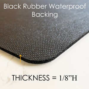 May include: Close-up of a black rubber waterproof backing with a textured surface. The thickness is 1/8"H. The text "Black Rubber Waterproof Backing" and "THICKNESS = 1/8"H" are displayed in white.