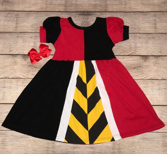 yellow red and black outfit