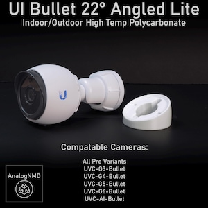 Puede incluir: Cámara de seguridad blanca UI Bullet 22° Angled Lite con lente negra y base de montaje. El texto "UI Bullet 22° Angled Lite" y "Indoor/Outdoor High Temp Polycarbonate" es visible. Compatible con varias variantes Pro.