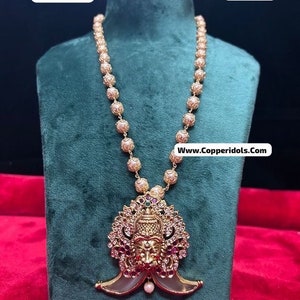 Panchaloha made gold polished acrylic puli nail mala with gundu beads